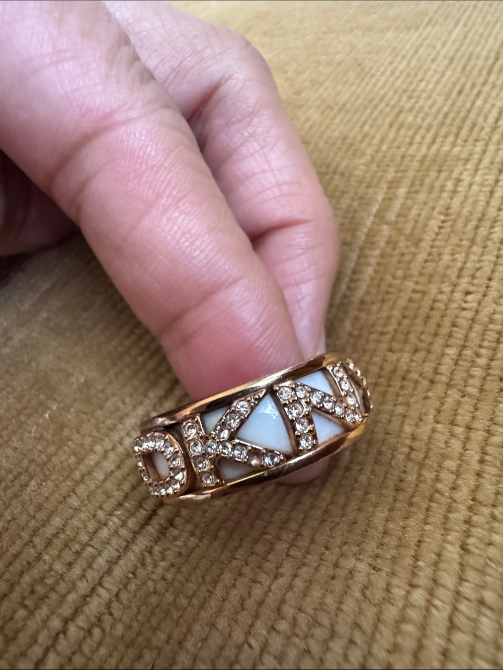 DKNY Gold-Tone Logo Ring with White Inlay and Crystal Accents